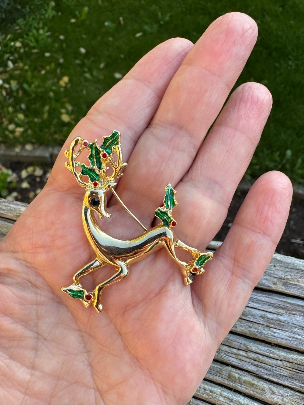 Gold-Tone Reindeer Holiday Brooch with Green and Red Accents